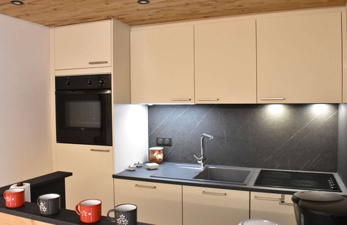 Meribel Village Apartment | Meribel: Spacious 3BR Apartment, Sleeps 6, 150m from Ski Lift, Free Shuttle & Covered Parking