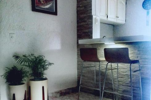 Downtown Cancun Apartment | Mi Otoch en Cancun jardín terraza asador