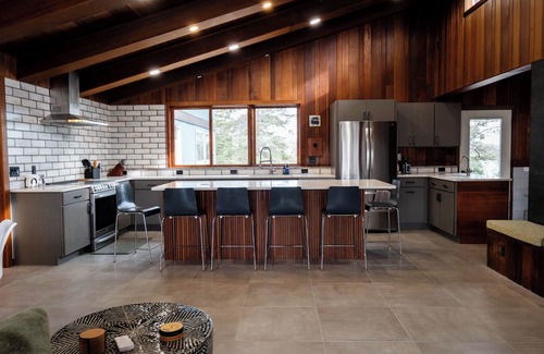 Friberg Cabin | Mid-Century Haven with Private Lakes and Endless Views
