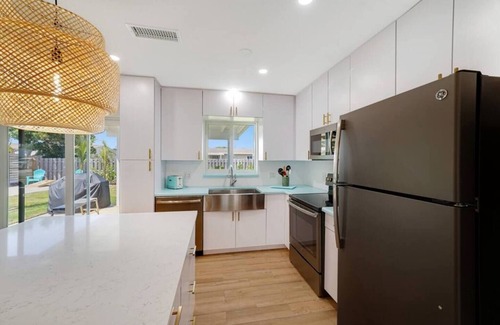 Deerfield Beach House | Mid-Century home by PMI unit 431
