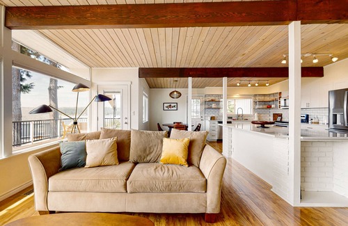 Poulsbo House | Mid-century home with stunning bay & mountain views, wraparound deck