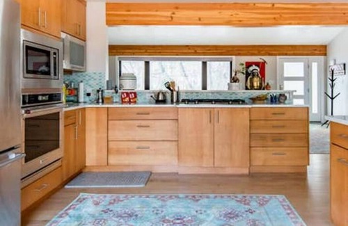 Broadmoor House | Mid-Century Modern Ranch Home On the Creek!