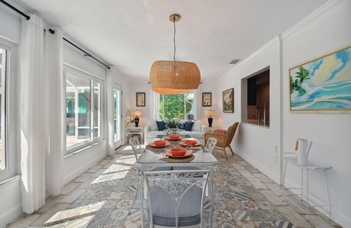 Desoto Lakes House | Mid-Century Modern pool home 3 Bed, 2 Bath home, walkways in the private garden
