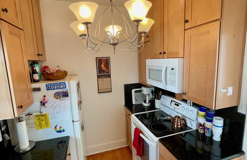 Uptown Historic District Condo | Mid-term furnished rental in the heart of Uptown with Pool & Gated Parking!