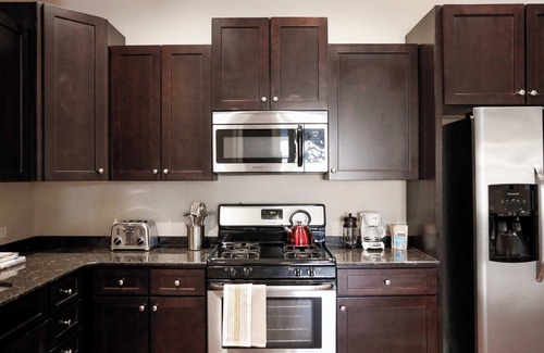 SoNo Apartment | Midtown Condo with High Ceiling!