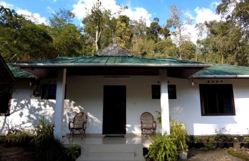 Devikolam Hotel | Mist Nest Cottages Munnar