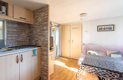 La Tremblade RV Rental | Mobile home in La Tremblade – Private garden, terrace, playground, and shared pool