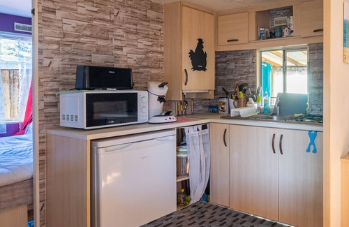 La Tremblade RV Rental | Mobile home in La Tremblade – Private garden, terrace, playground, and shared pool