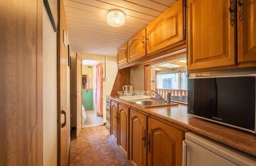 La Tremblade RV Rental | Mobile Home 'Mh16 La Tremblade' with Shared Pool, Private Terrace and Air Conditioning