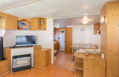 La Tremblade RV Rental | Mobile Home 'Mobilhome Mh343' with Shared Pool, Private Terrace and Private Garden