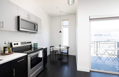 Milwaukee Apartment | Modern 1BR Apt with Skywalk to Fiserv, Rooftop, and Parking