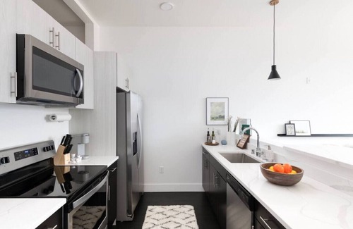 Milwaukee Apartment | Modern 1BR Apt with Skywalk to Fiserv, Rooftop, and Parking