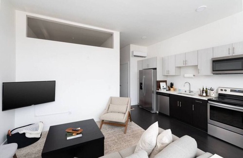 Westown Apartment | Modern 1BR Apt with Skywalk to Fiserv, Rooftop, and Parking