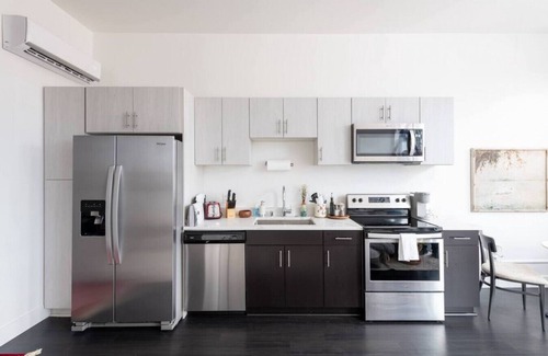 Westown Apartment | Modern 1BR Apt with Skywalk to Fiserv, Rooftop, and Parking