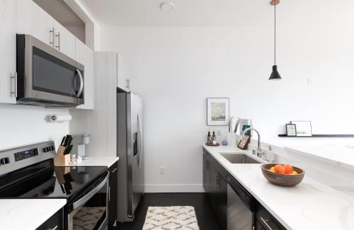 Milwaukee Apartment | Modern 1BR Apt with Skywalk to Fiserv, Rooftop, and Parking