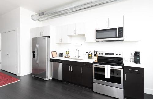 Milwaukee Apartment | Modern 1BR Apt with Skywalk to Fiserv, Rooftop, and Parking