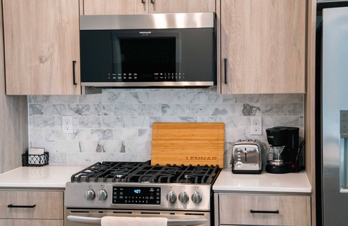 Clovis House | Modern 3-bedroom 2-bath townhome, perfectly balancing comfort and accessibility.