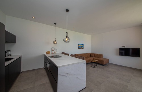 Cas Grandi Apartment | Modern 4 Persoons Appartement Blou
