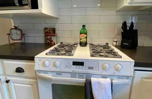 Omaha House | Modern 4BR 2BA house with 2 living rooms- 50” TVs - wifi Pay Monthly
