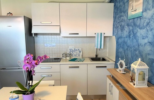 Aprilia Marittima Apartment | Modern apartment with panoramic terrace by Beahost Rentals