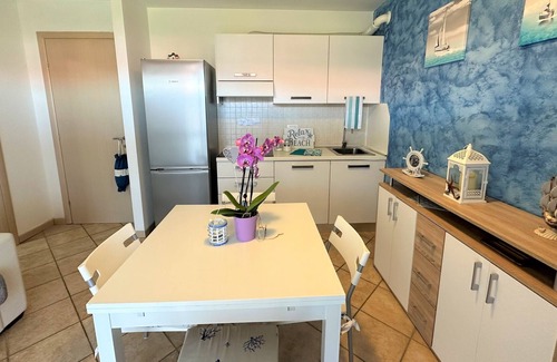 Aprilia Marittima Apartment | Modern apartment with panoramic terrace by Beahost Rentals