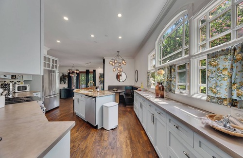Inman Park House | Modern-boho meets classic Victorian in this 5BR, 4BA Inman Park gem. Includes a separate in-law suite with full kitchen and laundry. Walk to BeltLine, MARTA, dining, and more!