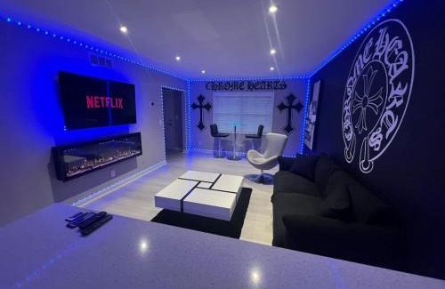 Loring Heights Apartment | Modern Chrome Heart Haven - Fireplace Bed