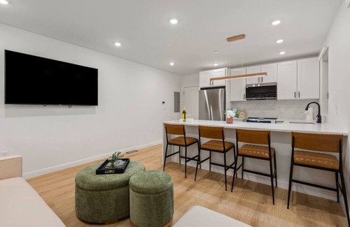 Jeffries Point Apartment | Modern Coastal City Stay | Waterfront & Airport