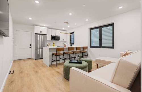 Jeffries Point Apartment | Modern Coastal City Stay | Waterfront & Airport