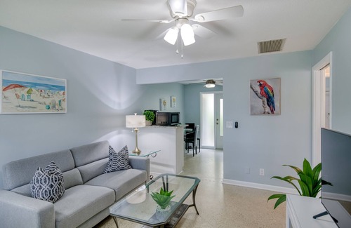 Singer Island Apartment | Modern condo near towering palms with beach decor, grill, & yard - walk to beach
