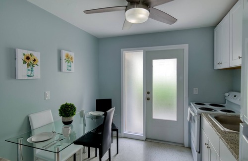 Singer Island Apartment | Modern condo near towering palms with beach decor, grill, & yard - walk to beach