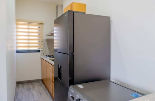 La Paz Condo | Modern Condo, Pools, Private BBQ, Malecon 4 Blocks