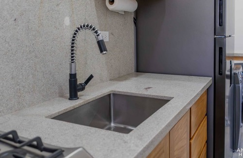 La Paz Condo | Modern Condo, Pools, Private BBQ, Malecon 4 Blocks