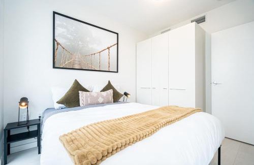 Mount Pleasant Apartment | Modern Condo with AC Gym and Parking near Olympic Village for 5