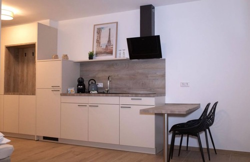 Jollenbeck Condo | Modern cozy purple apartment