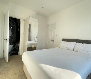 Edgware House | Modern Double Bedroom with Marble private bathroom