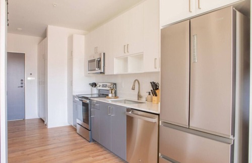 Yankee Hill Apartment | Modern East Side 1BR Apt with Balcony, Pool, and Gym