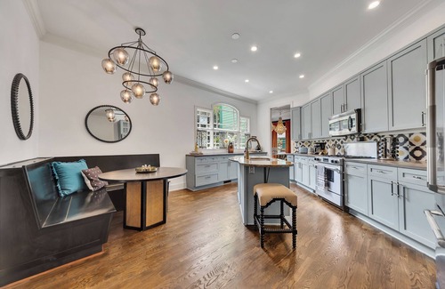 Inman Park House | Modern eclectic 4BR, 3BA home in the heart of Inman Park. Walk to the BeltLine, MARTA, top restaurants, and parks. Smart TVs, strong WiFi, front porch, and patio!