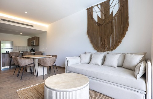 Playacar Condo | Modern, family-friendly condo with pool view, full kitchen & WiFi
