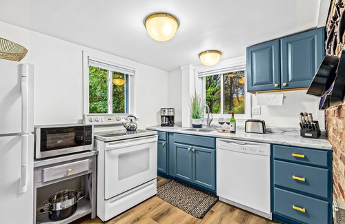 Plymouth House | Modern Farmhouse Bungalow with Firepit! King Bed + Walk to Downtown