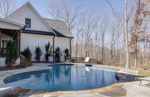 Franklin House | Modern farmhouse on 24 acres of trees with a heated pool