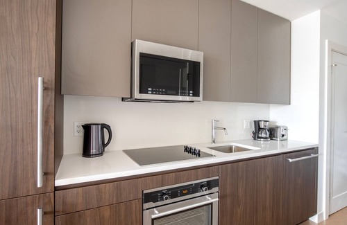 Fenway–Kenmore Apartment | Modern Fenway Studio w/W/D, Roof & Gym, nr Fenway Park, by Blueground