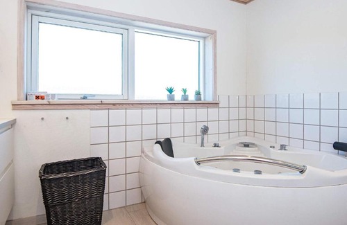 Fjellerup Strand House | Modern Holiday Home in Glesborg with Whirlpool