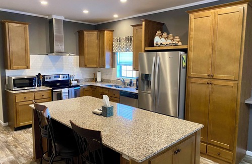 Marinette House | Modern Home on Trout Creek in Peshtigo “Fire City” w/Spacious Backyard & Deck!