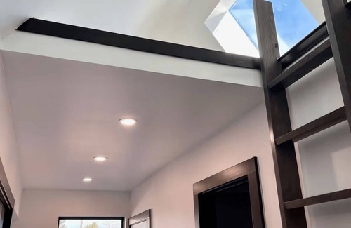 Cully House | Modern Home with Cedar Sauna & Outdoor Patio
