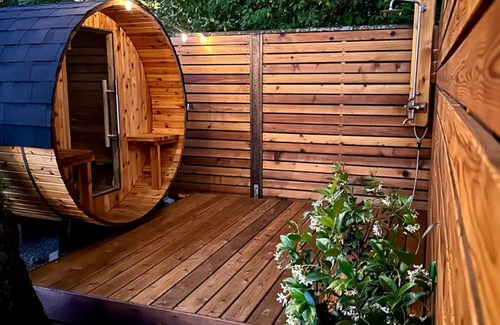 Cully House | Modern Home with Cedar Sauna & Outdoor Patio