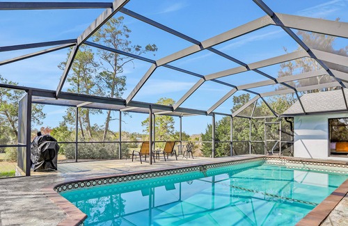 Spring Hill House | Modern home with enclosed private pool on 7th tee of Oak Hills Golf Club