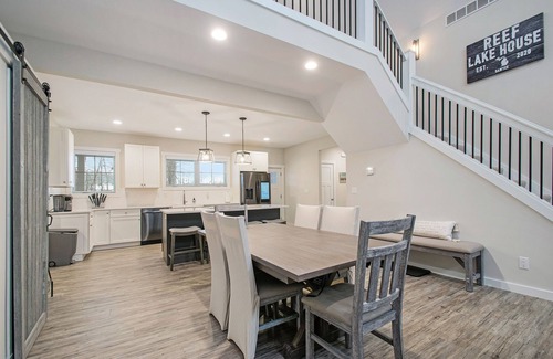 Sawyer House | Modern home with large sun-room, firepit, grill, washer/dryer, & central AC