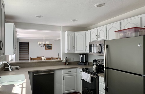 Marietta House | Modern lake house w/private lakefront, fire pit, kayaks, amenities, massive deck