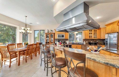 Laconia House | Modern Lake Opechee Home features Sandy Perched Beach and Dock